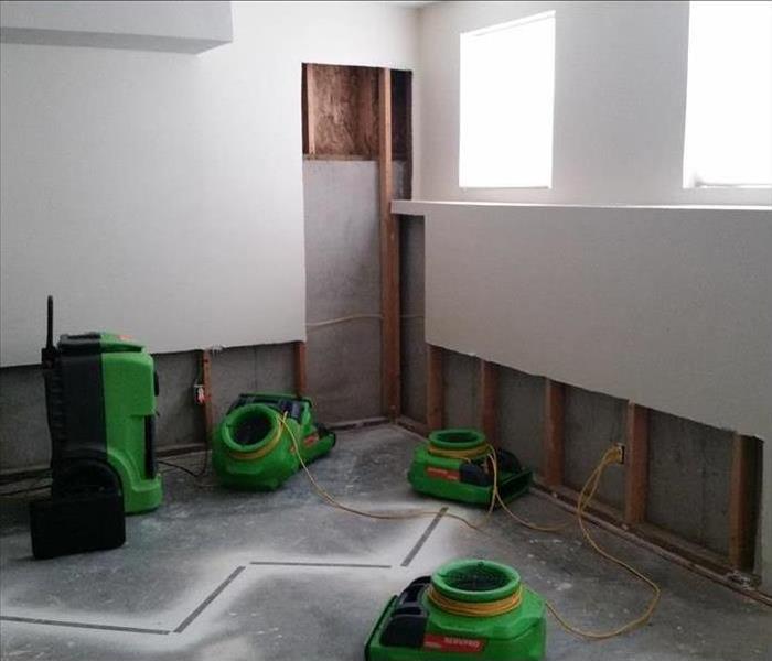 concrete pad, cut walls, and drying equipment